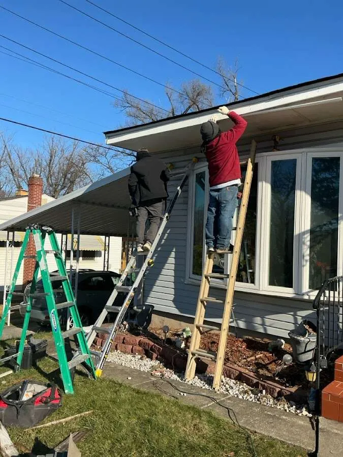 Restoration crew performing exterior repair in Coon Rapids